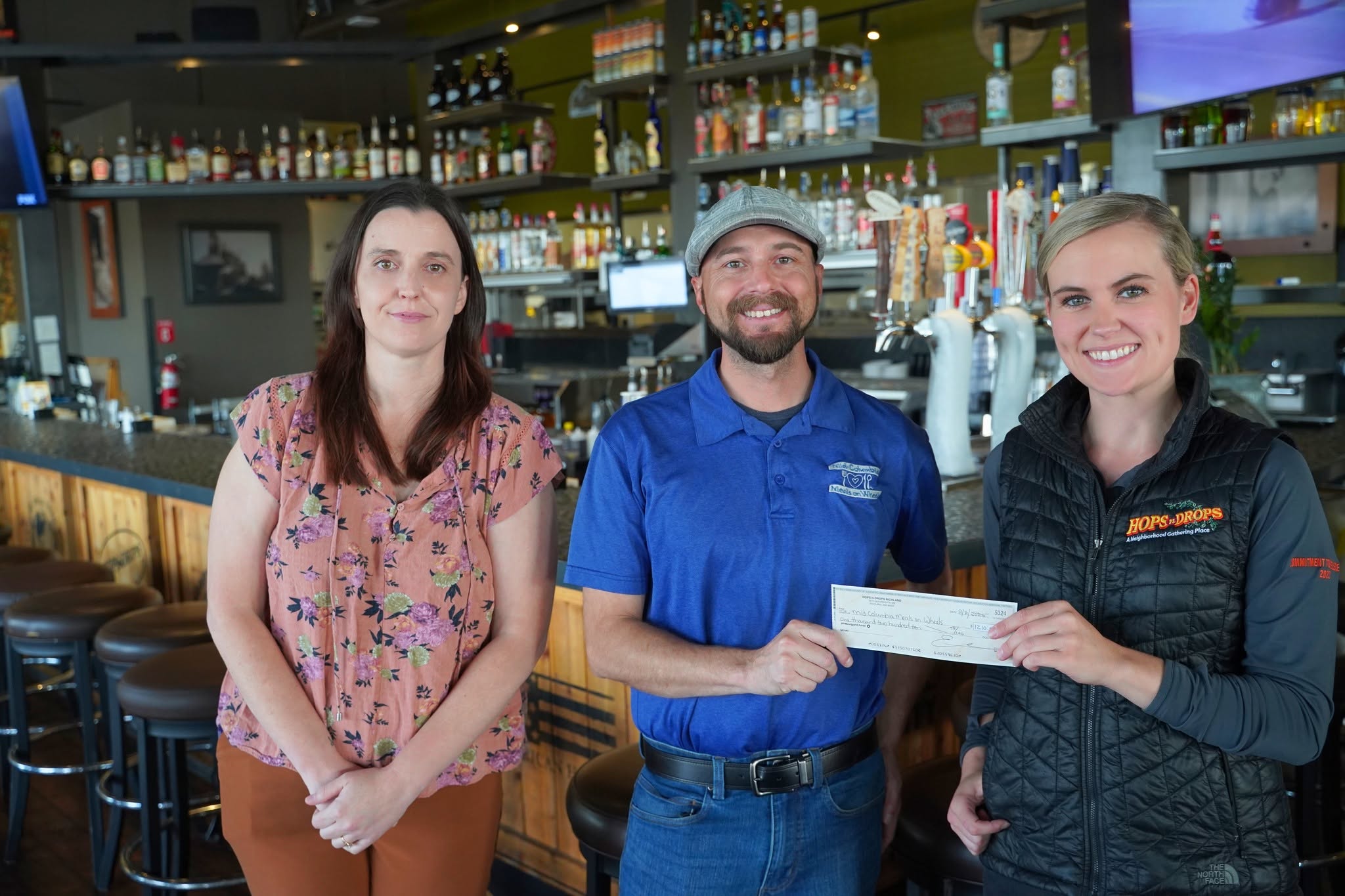 Amanda with Mid Columbia Meals on Wheels and a local restaurant partner